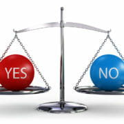 Image of a set of scales with yes on one side and no on the other